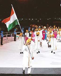 Indian flag bearer Rajyavardhan Singh Rathore leads the Indian contingent during the opening ceremony of the Commonwealth Games at the Melbourne Cricket Ground on Wednesday