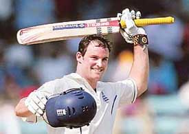 England�s Andrew Strauss celebrates on completing a century in the third Test against India at the Wankhede Stadium in Mumbai on Saturday