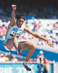 Anju Bobby George jumps as she competes in the women�s long jump qualifying round at the Commonwealth Games in Melbourne on Wednesday