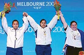 Simple Kaur Bhumrah, Geeta Rani  and New Zealander Keisha-Dean Soffe during the medal awarding ceremony at the Commonwealth Games in Melbourne on Wednesday