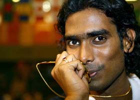 Sharath Achanta kisses his gold medal after beating Australia�s William Henzell in the men�s table tennis single�s final at the Commonwealth Games in Melbourne