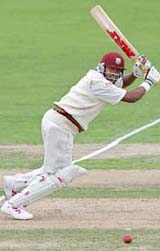 Brian Lara of the West Indies hits a boundary on his way to 83 during the second day of the third Test against New Zealand in Napier on Sunday