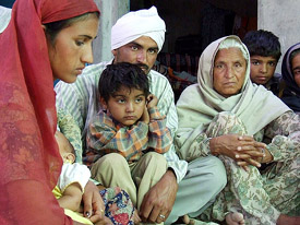 The bereaved family of Sarmukh Singh at their residence at Jethuke village, near Bathinda, on Friday. 