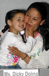 Dicky Dolma, the youngest woman to climb the Everest, hugs her daughter Anushka during the screening of the film “Everest” in the Dome Theatre of Science City, near Kapurthala, on Saturday