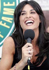 Former tennis player Gabriela Sabatini of Argentina laughs during a press conference at the Nasdaq-100 Open in Key Biscayne, Florida