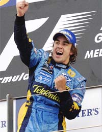 Renault driver Fernando Alonso of Spain celebrates after winning the Australian Formula 1 Grand Prix in Melbourne