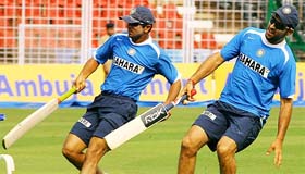 Rahul Dravid runs with Yuvraj Singh during a training session on the eve of the third one-dayer against England at the Jawaharlal Nehru Stadium in Margao, Goa