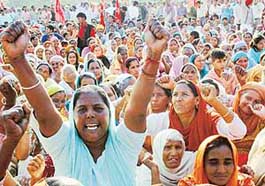 Members of the Pendu Mazdoor Union, Punjab, protesting at Matka Chowk in Sector 17, Chandigarh, on Tuesday. 