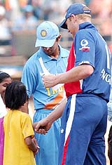 Indian cricket captain Rahul Dravid and his English counterpart Andrew Flintoff shake hands with HIV-positive girls ahead of the fourth ODI in Kochi on Thursday