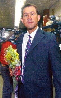 Australian captain Ricky Ponting holds a bouquet after his arrival at Zia International Airport in Dhaka on Thursday. Australia will play two Tests and a one-dayer against Bangladesh. The first Test starts on Sunday