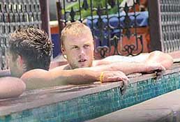 England captain Andrew Flintoff relaxes in the swimming pool of Taj Malabar Hotel in Kochi on Friday. 