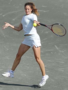 Patty Schnyder of Switzerland returns a serve to Meilen Tu of the USA during their second round match at the Family Circle Cup in Charleston, South Carolina, on Tuesday. Schnyder won 6-4, 7-5.