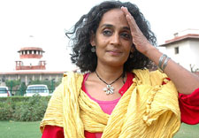 Booker Prize-winning author and an activist of the Narmada Bachao Andolan Arundhati Roy comes out after the hearing of the Sardar Sarovar Dam case in the Supreme Court in New Delhi, on Monday