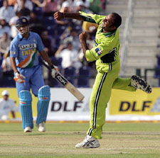 Pakistan�s Rana Naved-ul-Hasan celebrates Rahul Dravid�s run out during the first one-day international Cricket between India and Pakistan at the Zayad Cricket Stadium in Abu Dhabi 