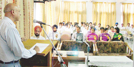 Dr Prem Kumar, Director, Sri Aurobindo College, addresses students and faculty members of the Guru Nanak Institute of Management and Technology (GNIMT) during a seminar in Ludhiana on Saturday.