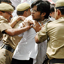 Medical students being stopped by Delhi police jawans during a protest against the government recommendation to make 27.5 per cent reservation for backward classes in the education sector and in government jobs in New Delhi on Wednesday.