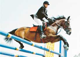 Anant Rajpurohit clears a hurdle during the show jumping event at the Chandigarh Horse Show on Thursday