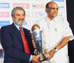 ICC President Ehsan Mani  and BCCI President Sharad Pawar with the ICC Champions Trophy during its official launch in New Delhi on Thursday