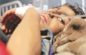 A survivor of the massacre of Hindus in Doda district at a hospital in Jammu