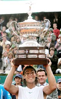 Spain�s Rafael Nadal holds the trophy after beating compatriot Tommy Robredo in the final of the Open Seat Godo in Barcelona on Sunday
