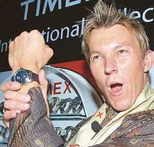 Australian fast bowler Brett Lee poses with a new range of Timex watches in New Delhi on Tuesday