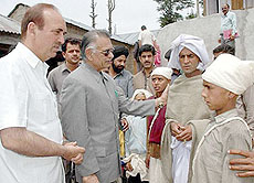 Union Home Minister Shivraj Patil (second from left) with kin of Hindus killed by terrorists in Basantgarh village of Udhampur in Jammu and Kashmir on Tuesday.