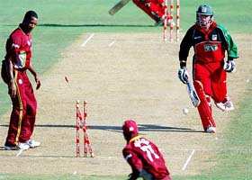 Zimbabwe captain Terry Duffin is run-out by West Indies wicketkeeper Denesh Ramdin during the fifth ODI in Castries, St.Lucia, on Wednesday