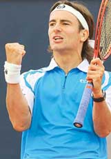 Spain�s Tommy Robredo celebrates after beating Czech Radek Stepanek in the final of the Hamburg Masters tennis tournament on Sunday. 