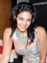 Bollywood actress Mandira Bedi poses at the launch of a leading French magazine, Marie Claire