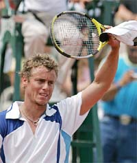Australia�s Lleyton Hewitt celebrates after winning his third-round match against Slovakia�s Dominik Hrbaty during the French Open at Roland Garros in Paris