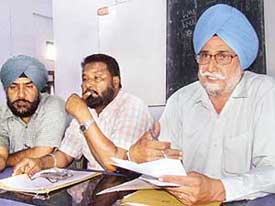 Office-bearers of National Federation of Telecom Employees address a press conference in Bathinda on Tuesday. 