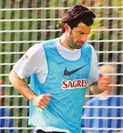 Portugal�s Luis Figo warms up during a training session in Marienfeld on Friday. 