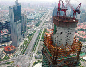 The World Financial Centre is under construction in Shanghai. The 101-story, 492-meter-tall building will be one of the tallest in the world after its completion in 2008. The building is currently at a height of 200 meters.
