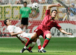 Portugal�s Cristiano Ronaldo (right) and Iran�s Hossein Kaebi fight for the ball during their Group D match in Frankfurt on Saturday. 