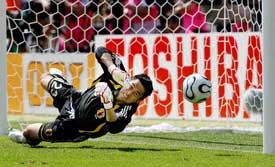 Japanese goalkeeper Yoshikatsu Kawaguchi saves a penalty during a Group F match between Japan and Croatia in Nuremberg on Sunday