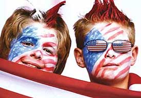 US fans cheer during the Italy vs USA Group E match in Kaiserslautern on Saturday