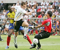 Germany�s Miroslav Klose (centre) scores his team�s second goal against Ecuador during their Group A match in Berlin on Tuesday. 
