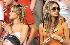 Cheryl Tweedy (left), girlfriend of England�s Ashley Cole, and Victoria Beckham, wife of England�s captain David Beckham watch the England vs Ecuador match.