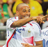 French forward Thierry Henry celebrates after scoring the winning goal for his team during the quarterfinal match against Brazil in Frankfurt on Saturday.