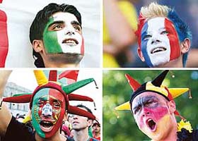 A combination picture shows football fans (clockwise from top left) of Italy, France, Germany and Portugal during the World Cup