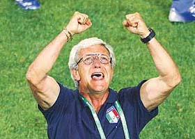 Italy coach Marcello Lippi celebrates after Italy beat Germany in the first semifinal