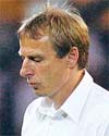 Germany coach Juergen Klinsmann looks dejected after their semifinal lost to Italy in Dortmund