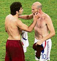 Portugal�s Luis Figo exchange shirts after the match.