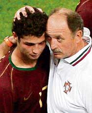 Portugal�s coach Luiz Felipe Scolari (right) consoles star forward Cristiano Ronaldo after losing to France in Munich on Wednesday. 
