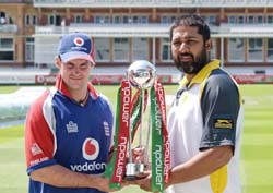 England�s cricket captain Andrew Strauss (left) and his Pakistani counterpart Inzamam-ul-Haq pose with the trophy for the Test series at the Lord�s cricket ground in London on Tuesday. The first Test starts on Thursday. 