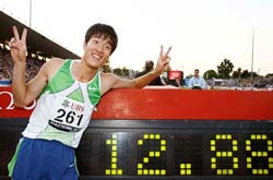China�s Liu Xiang jubilates after breaking the men�s 110 meters hurdles record at the Athletissima athletics meet in Lausanne, Switzerland, on Tuesday. Xiang won in a time of 12.88 seconds. 