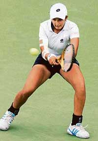 Sania Mirza returns a volley to Alexandra Stevenson of the US during the Western & Southern Financial Group Women�s Open in Cincinnati on Tuesday.