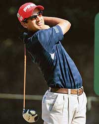 Shiv Kapur watches his tee shot on the fifth hole during a practice round for the British Open Championship at the Royal Liverpool Golf Club in Hoylake on Tuesday.