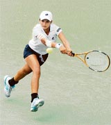 Sania Mirza returns a volley to Emma Laine of Finland during their second round match at the Cincinnati Open in Cincinnati, Ohio (USA), on Wednesday