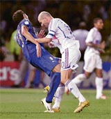 File picture shows Italy�s Marco Materazzi as he falls on the pitch after being head-butted by France�s Zinedine Zidane during their World Cup final match in Berlin 